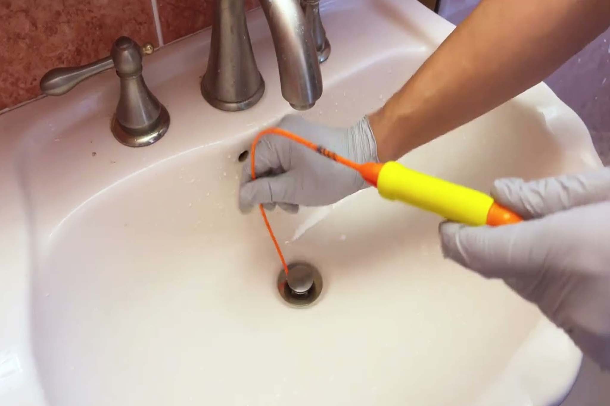 Hair clog removed from Phoenix home drain pipe
