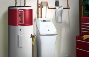 Turnkey high-efficiency water softener installation completed by Aqua Plumbing Services in a Phoenix garage.
